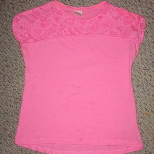 A pink size 9 kids girls tee.